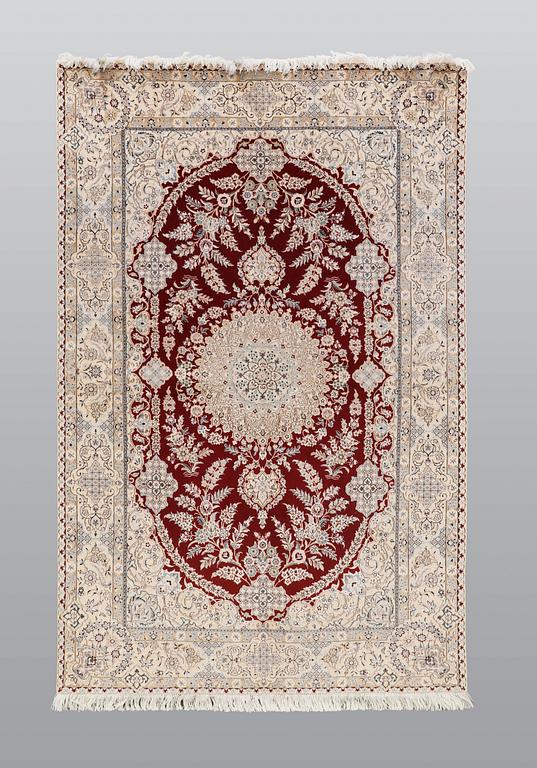 A carpet, Nain part silk s.k 6LAA, 239 x 155 cm.