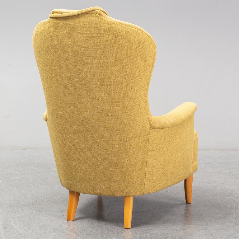 A Carl Malmsten ' farmor' chair.