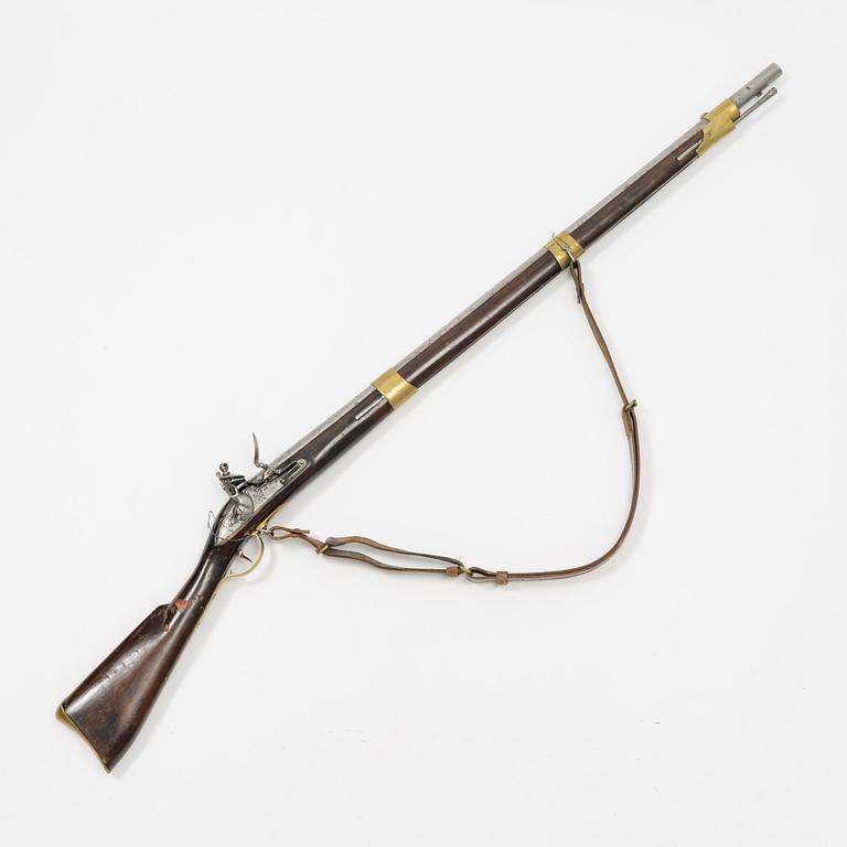 A Swedish flintlock rifle with Brtitish lock.