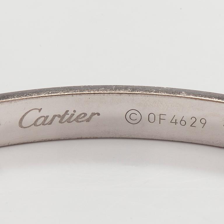 Cartier, rannekoru "Love", 18K valkokultaa, briljanttihiottuja timantteja.