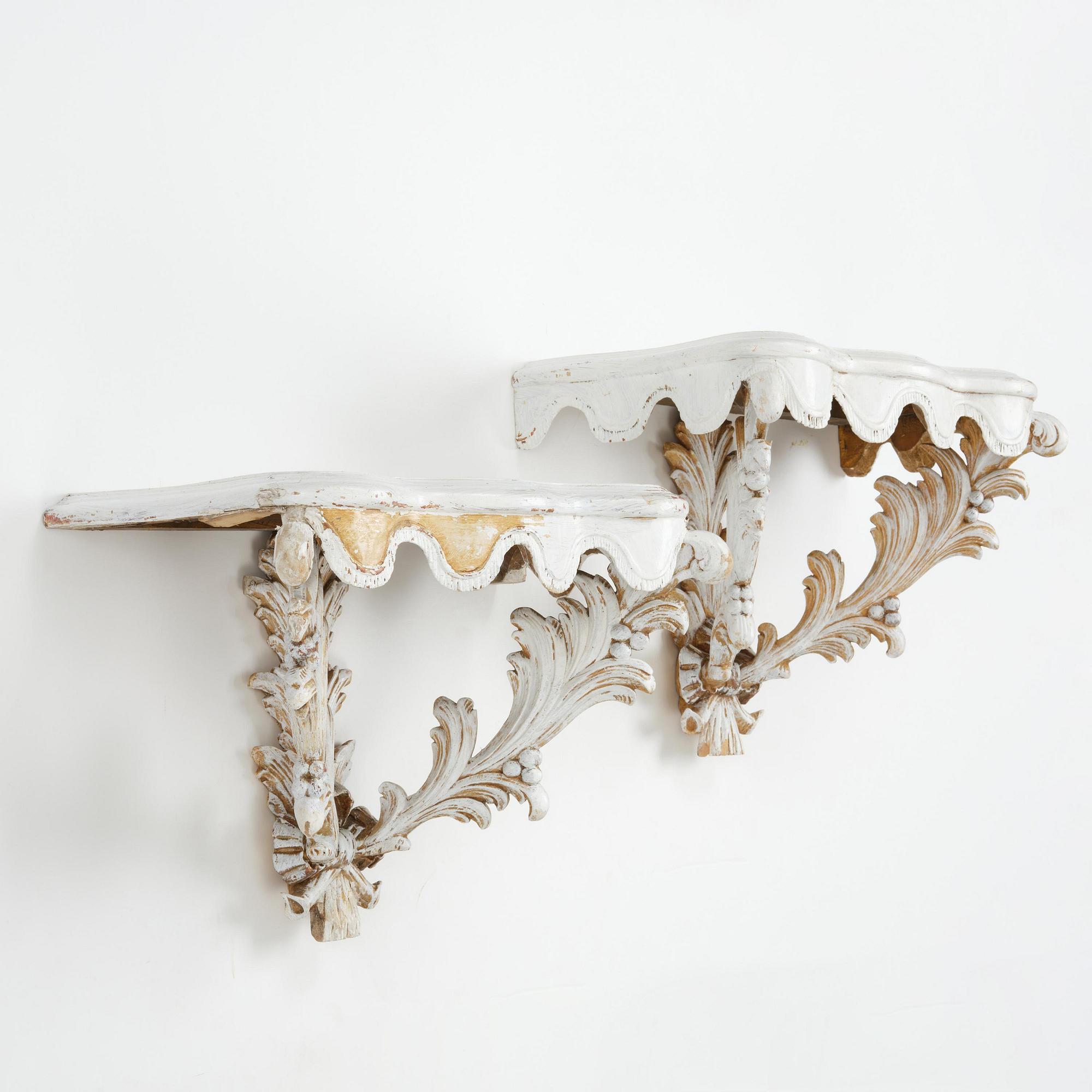 A pair of French Louis XVI-style consoles, late 19th century.