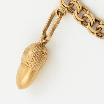 Bracelet, 18K gold with charms.