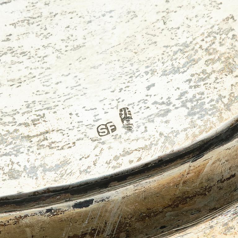 A lobed silver tray on four feet, Shanghai, Singfat, China Trade.