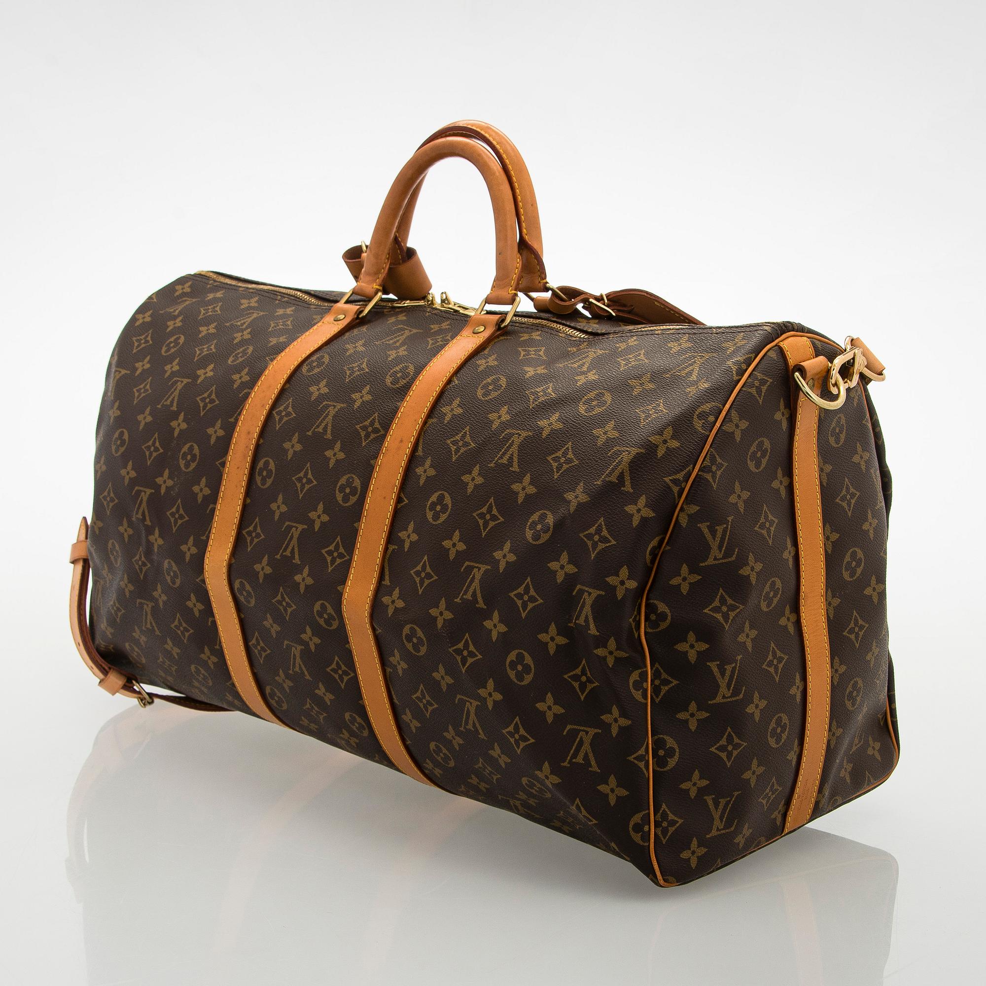 Louis Vuitton, a Monogram Canvas 'Keepall 55 Bandoulière' weekend bag.