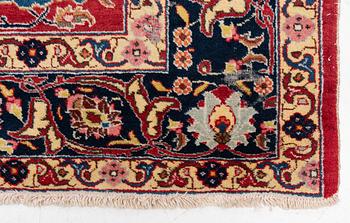A semi-antique Tabriz carpet, c 358 x 248 cm.