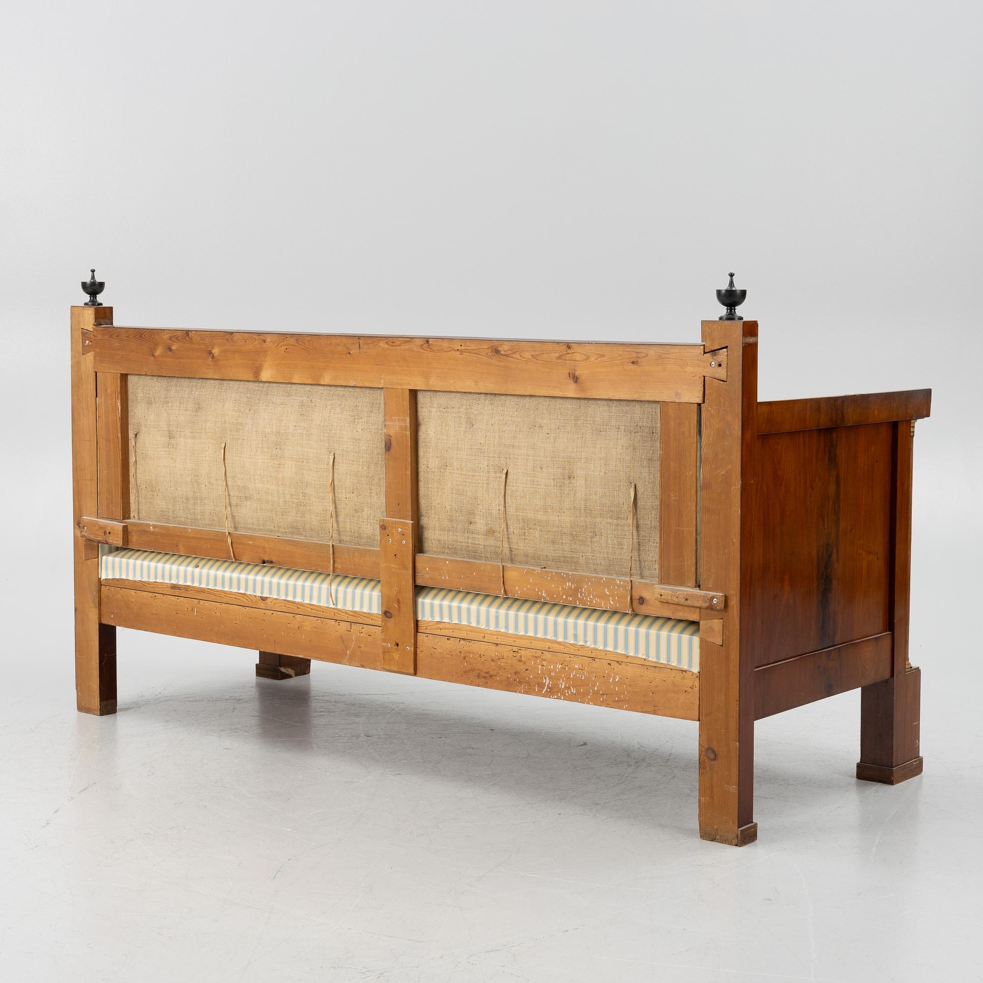 An Empire sofa, first half of the 19th century.