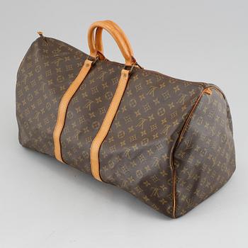 A monogram canvas weekendbag "Keepall 55" by Louis Vuitton.