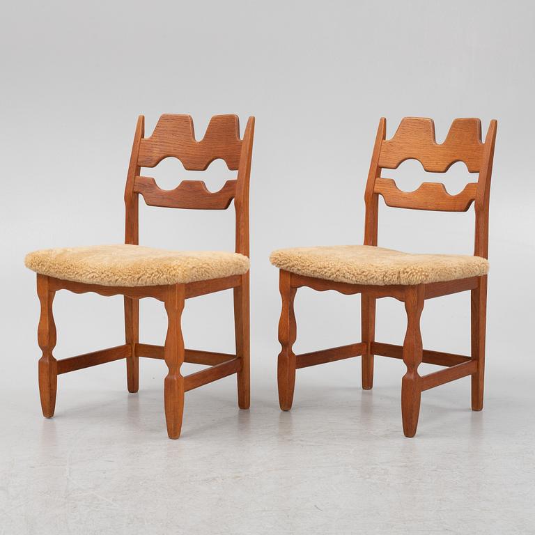 Henning Kjærnulf, a set of six oak 'Razorblade' chairs with new sheepskin upholstery, Nyrups, Denmark, 1960s.