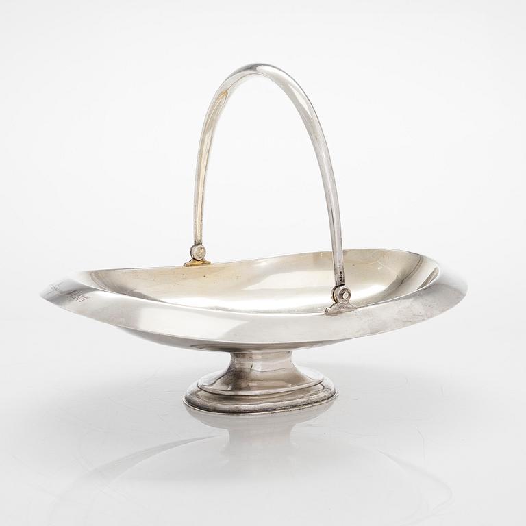 A four-piece silver coffee set, St. Petersburg 1887, original fitted box from Khlebnikov. Sugar tong, Moscow around 190.