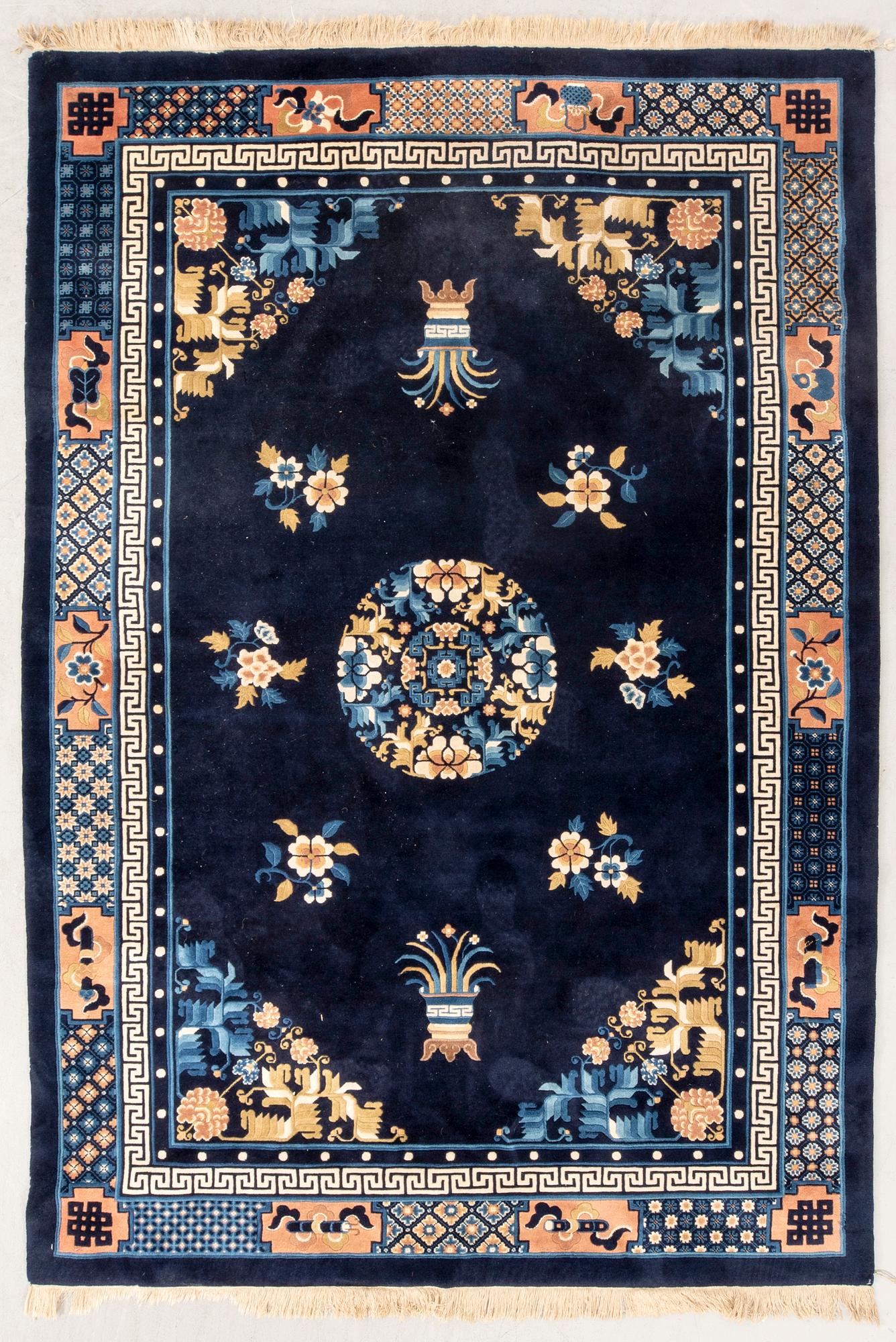 An old China carpet ca 274x183 cm.
