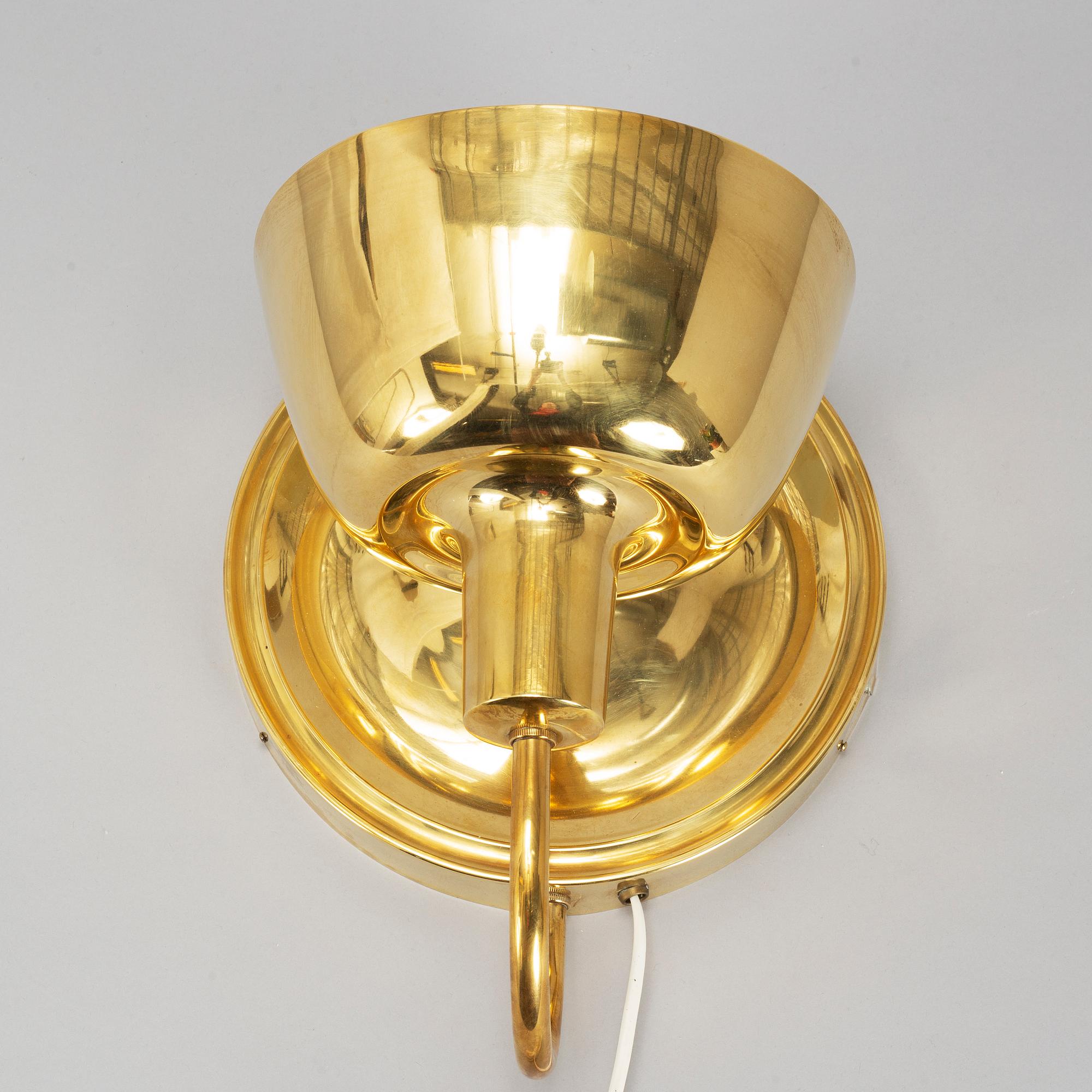 A brass wall light model 2389 by Josef Frank, Firma Svenskt Tenn.