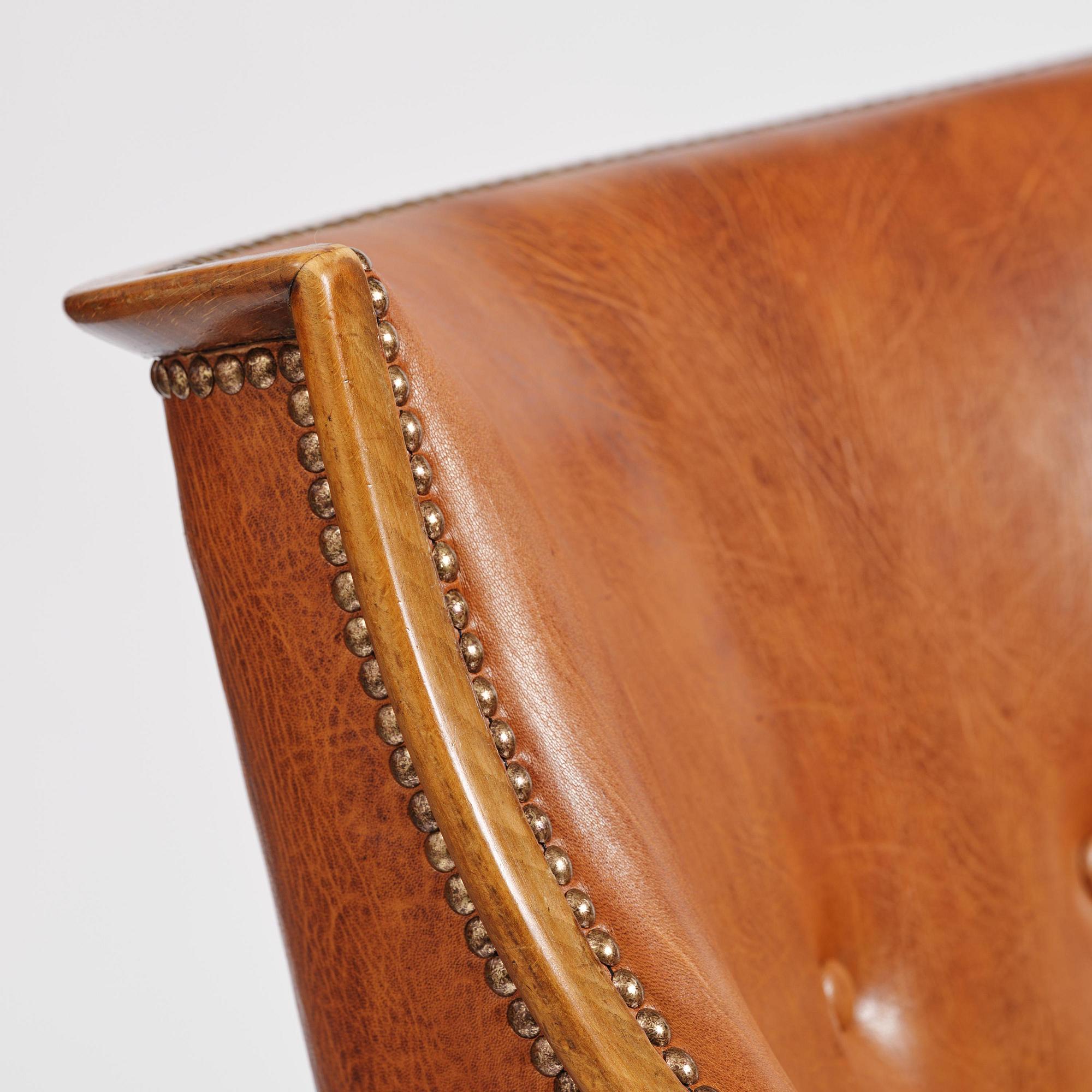 Frits Henningsen, a pair of armchairs, mid-20th century.