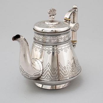 A Russian 19th century parcel-gilt silver tea pot and cream jug, mark possbly of Alexander Lokin, St. Petersburg 1893.