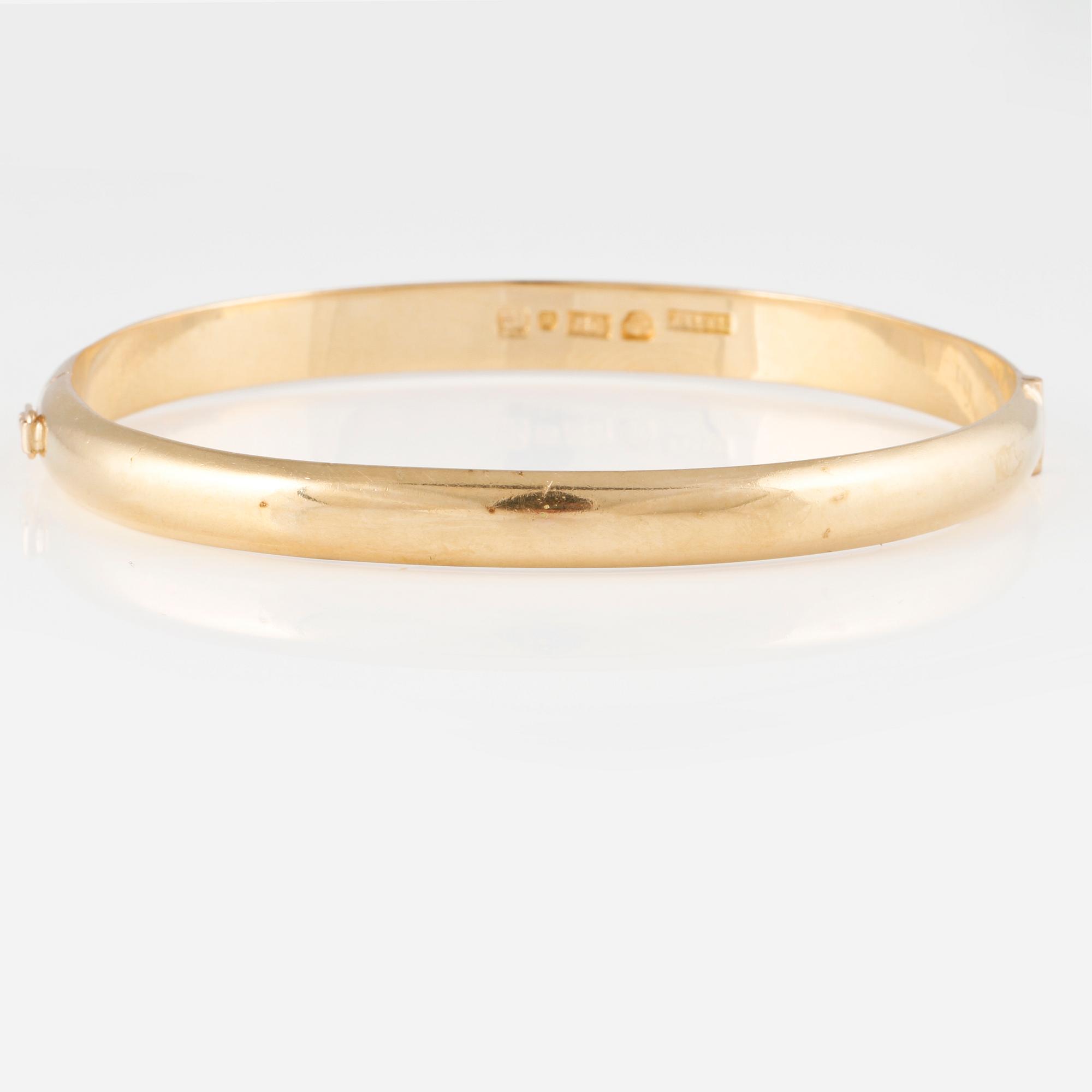 ARMRING, 18K guld, Ossner & Larsson, Göteborg, 1958. Vikt 30,5 gram.