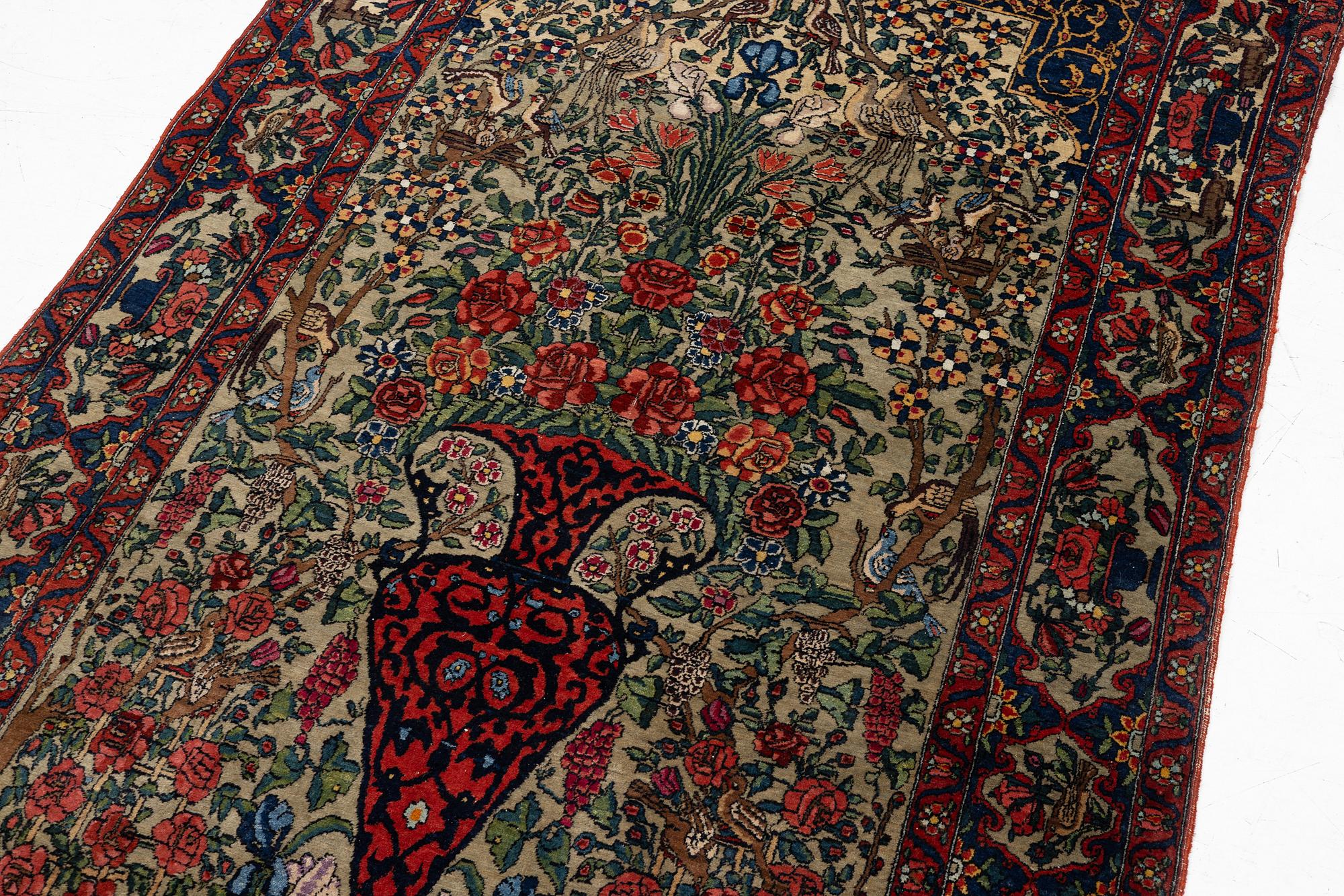 A figural oriental rug, c.. 230 x 130 cm.