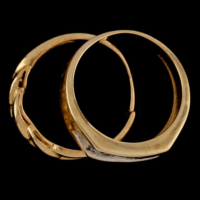 RINGAR, 2 st, 18k guld och vitguld samt en liten briljantslipad diamant, 1900-tal. Vikt 10 g.