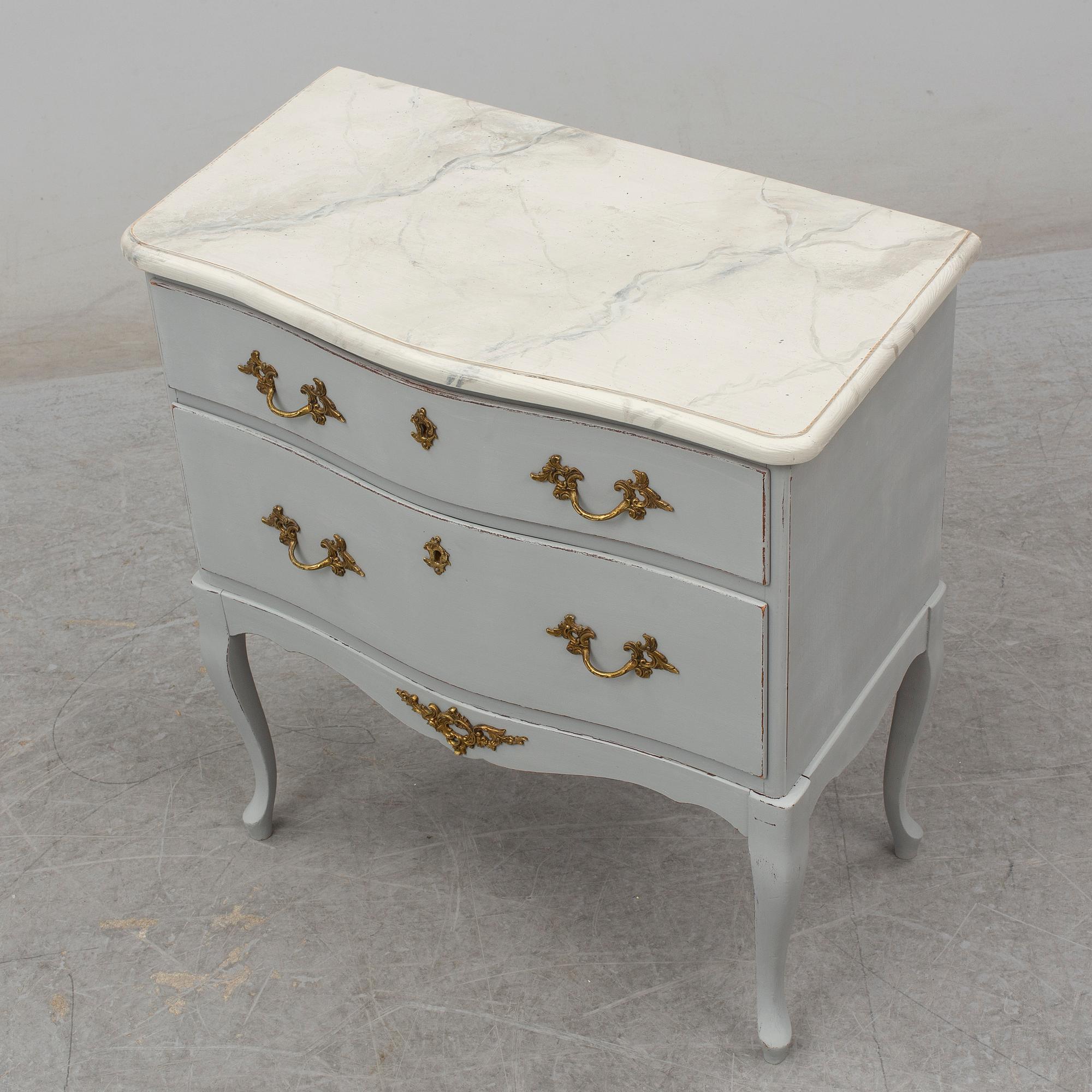 A Rococo style chest of drawers, second half of the 20th century.
