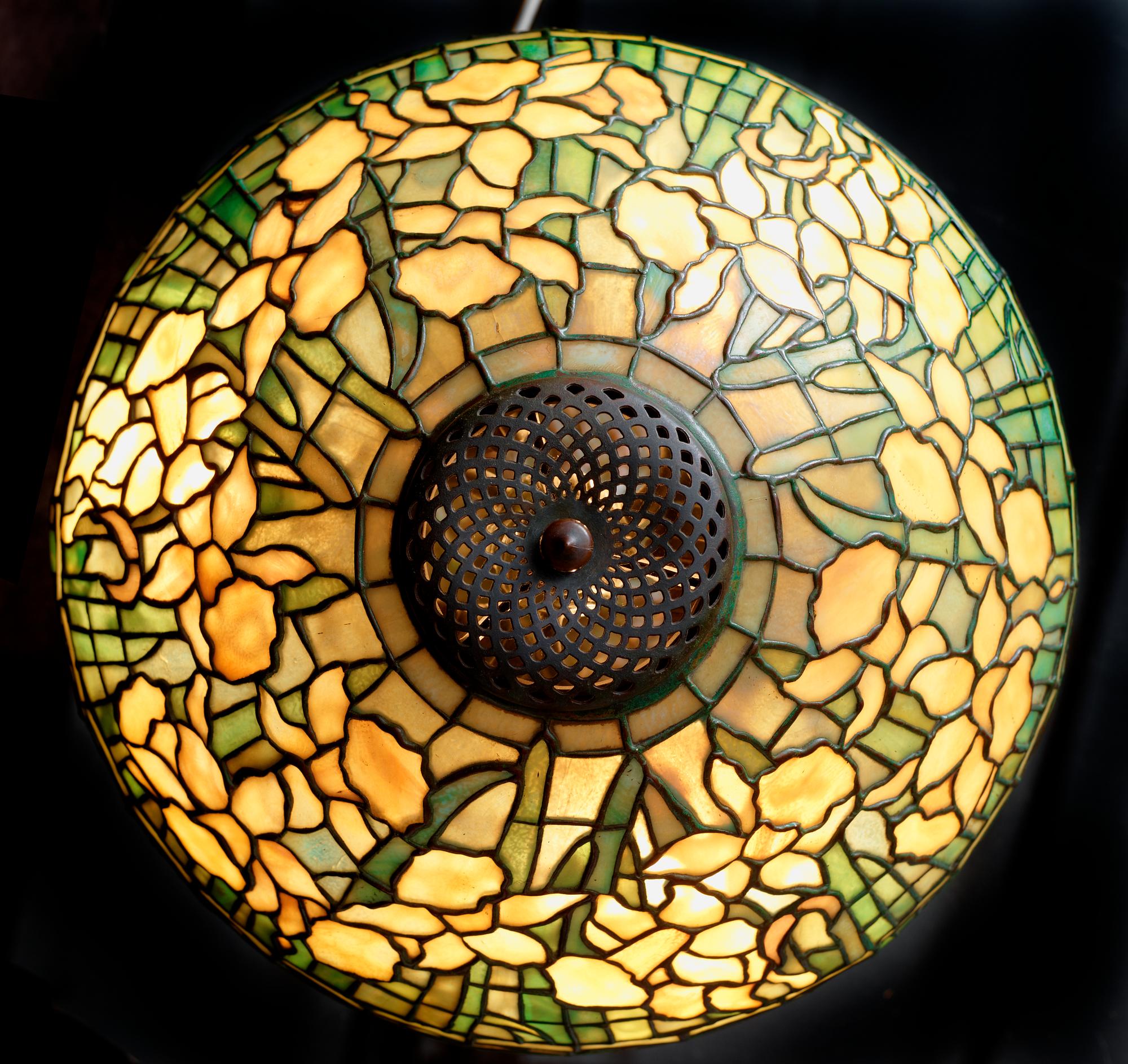 A Tiffany Studios Art Nouveau 'Daffodils' bronze base table lamp, New York circa 1910-15.