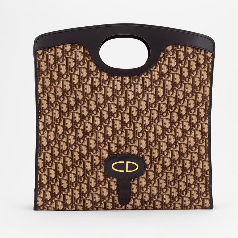 Christian Dior, a canvas tote bag.