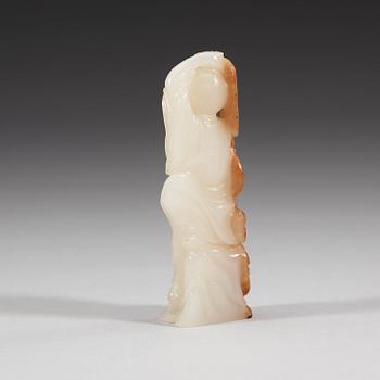 A carved nephrite figurine, presumably late Qing dynasty (1644-1912).