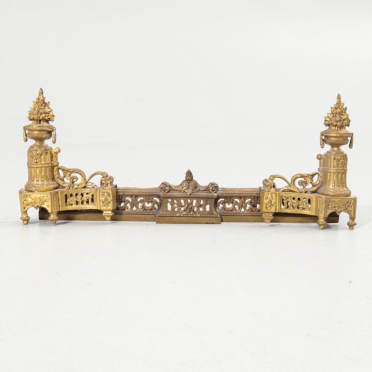Pair of candelabra and a firedog, 18th/19th century.