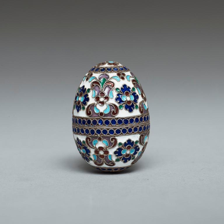 A Russian late 19th/early 20th century silver-gilt and enamel egg.