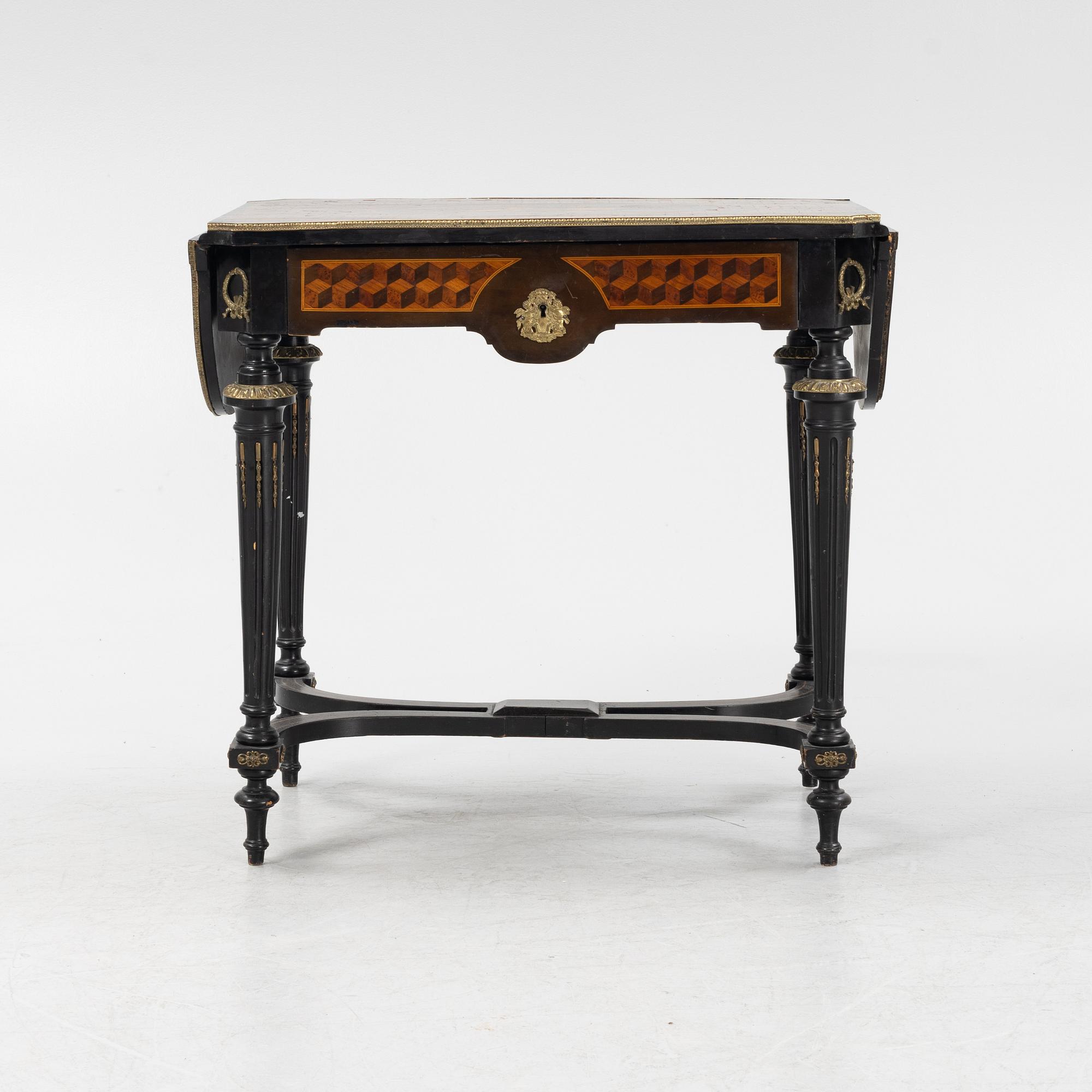 A Louis XVI style table, second half of the 19th century.