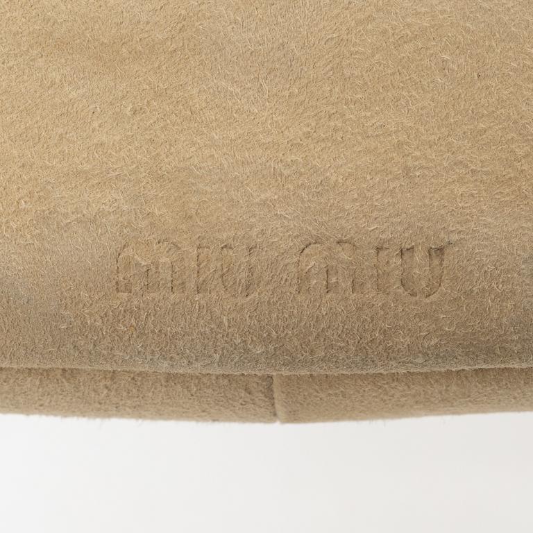 Miu Miu, a handbag.