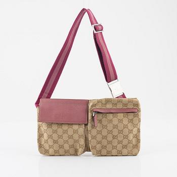 Gucci, a canvas beltbag.