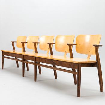 ILMARI TAPIOVAARA, An early 1950s five-seater 'Domus' bench row.