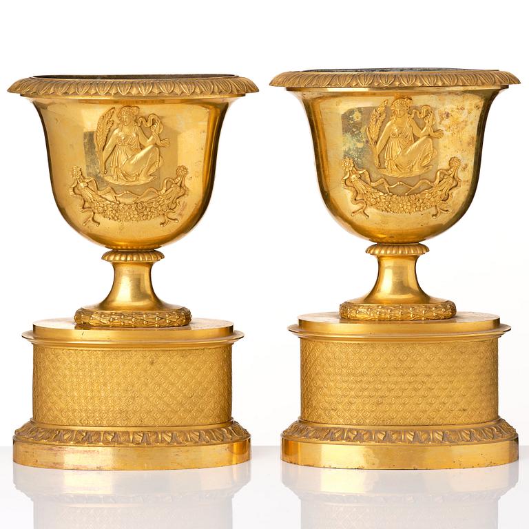 A set of three French Empire early 19th century gilt bronze centre pieces.