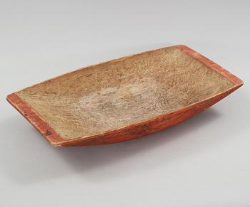 A wooden bowl from the 19th century.