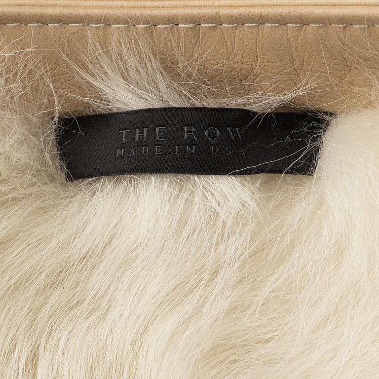 The row, a sheepskin coat, size 2.