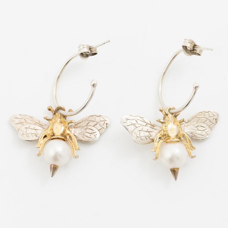 Maria Nilsdotter, a single earring, "rain earring" and a pair, silver with pearls and quartz.