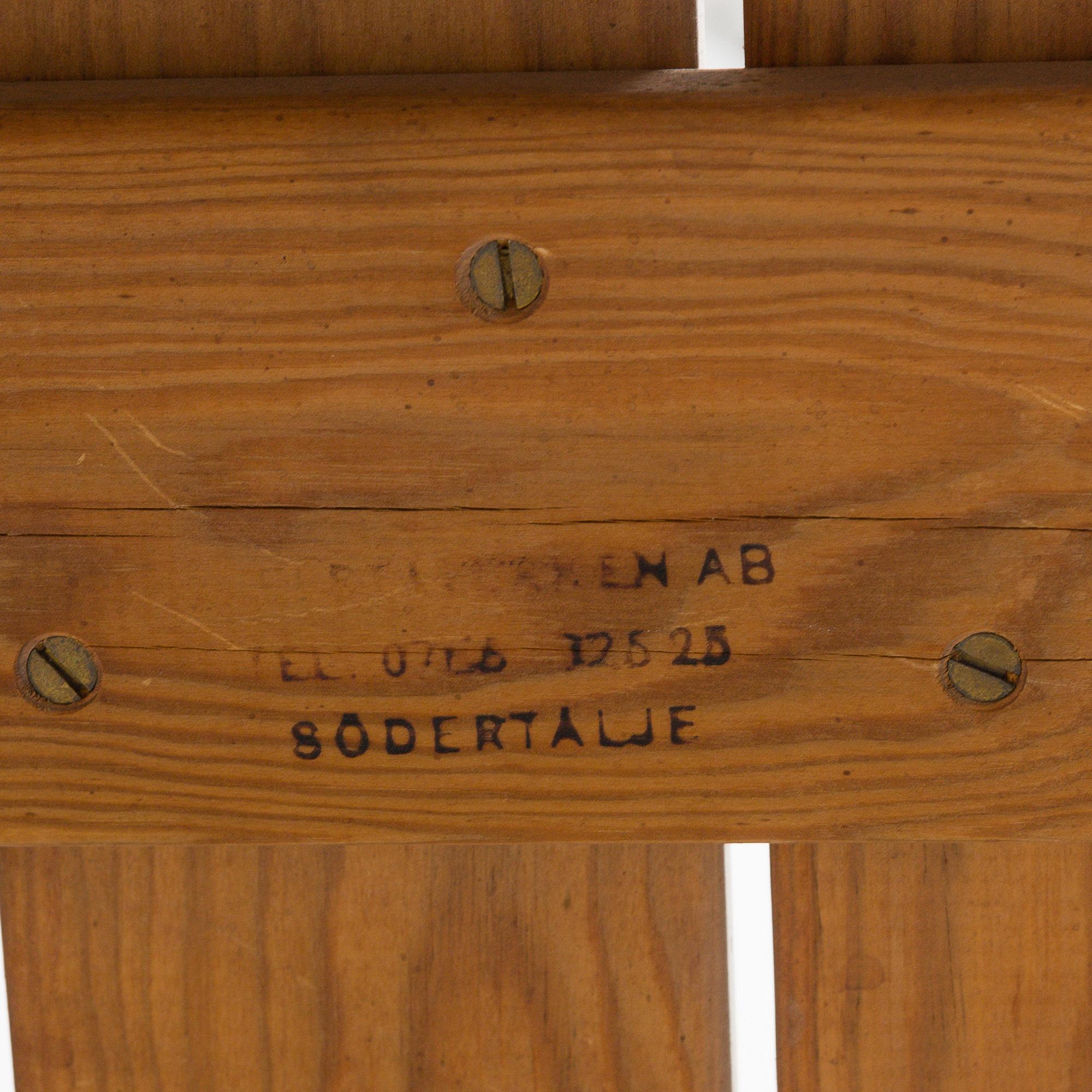 A Carl Malmsten "Bergshamra" garden table and four chairs, first half of the 20th century.