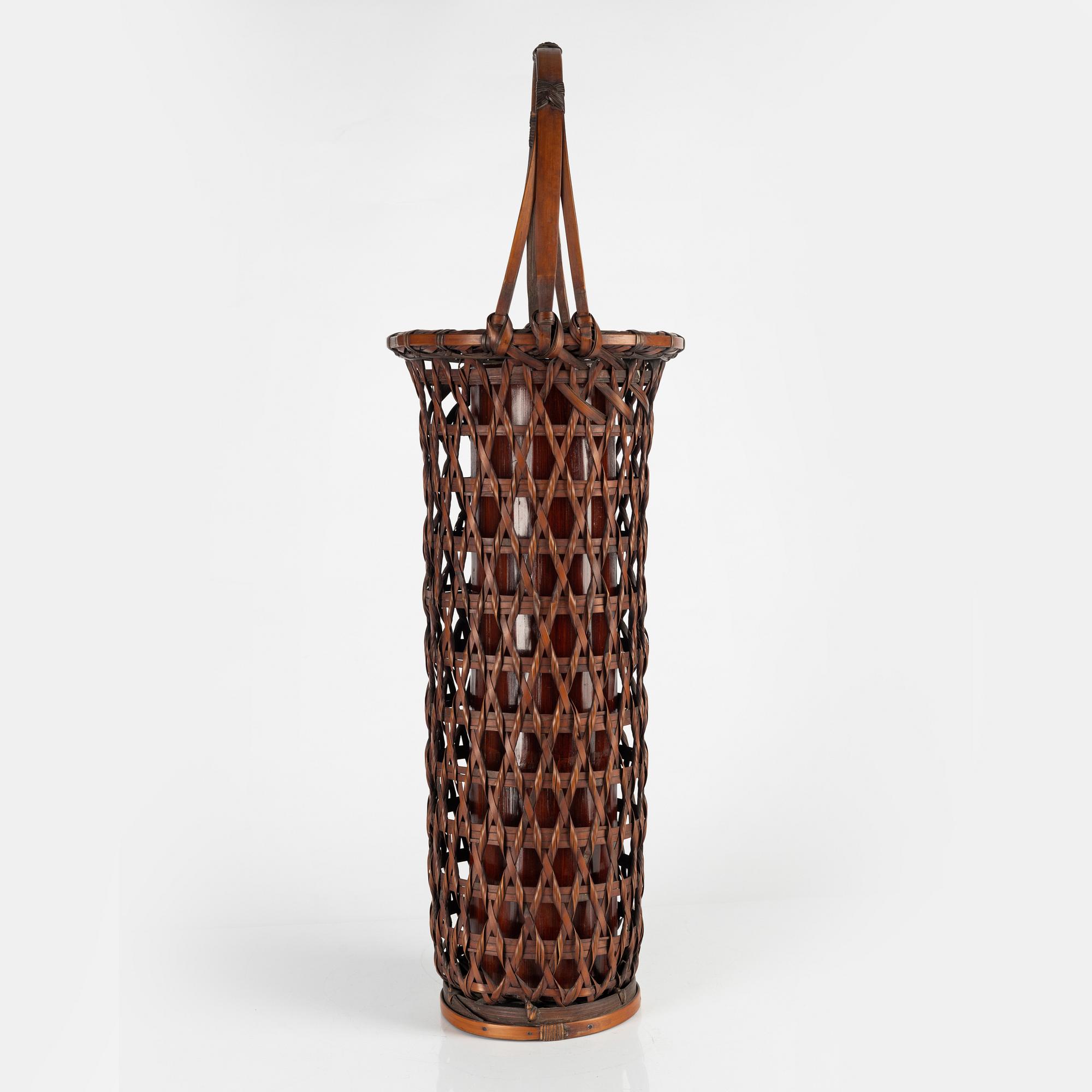 A Japanese Ikebana flower basket, 20th Century. Signed.