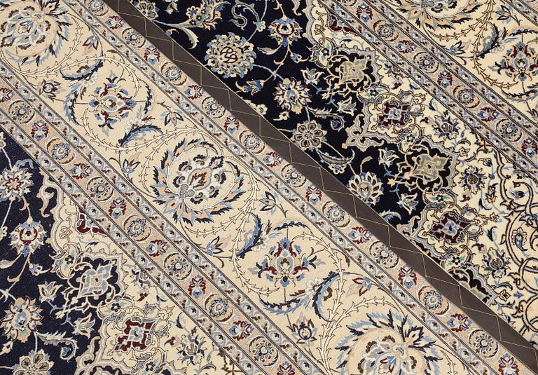 A part silk Nain carpet, so-called 4LAA, approx. 318 x 219 cm.