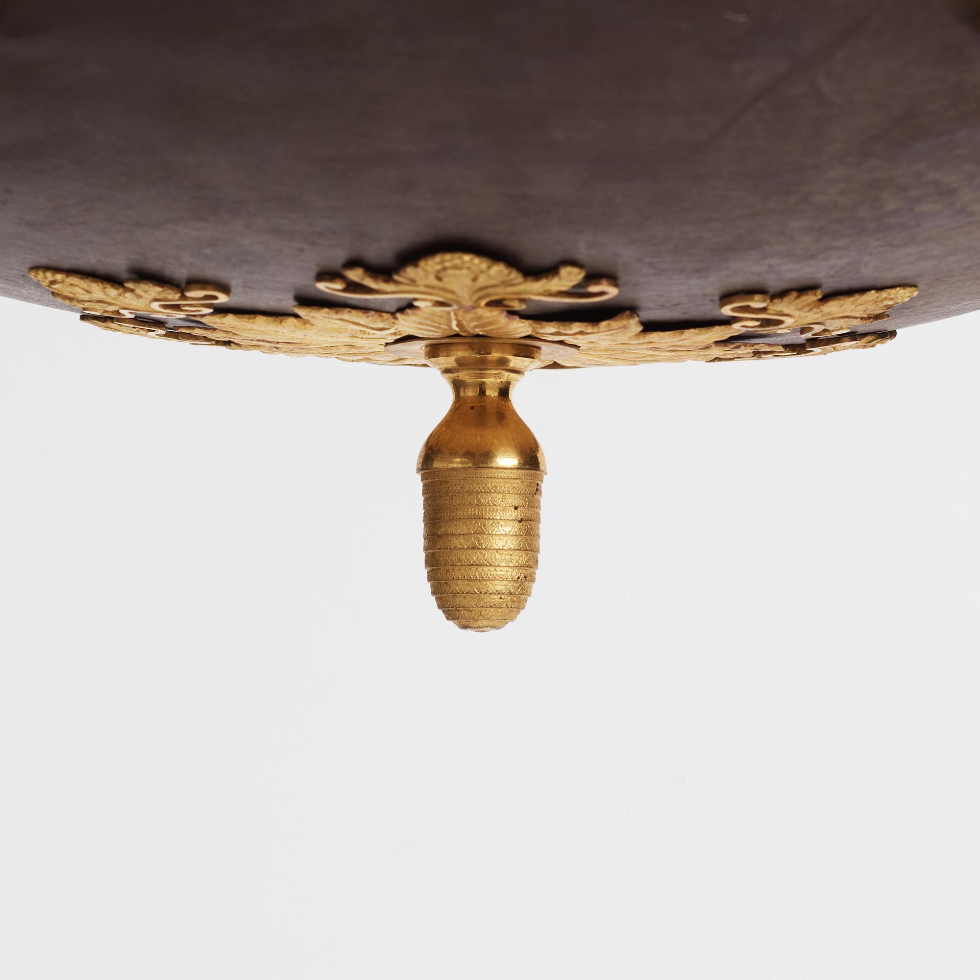 A Swedish Empire ormolu and tole six-branch chandelier, Stockholm, early 19th century.