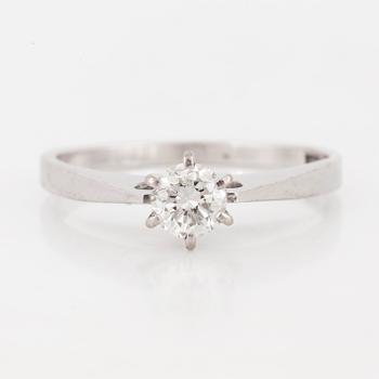 A brilliant-cut diamond ring.