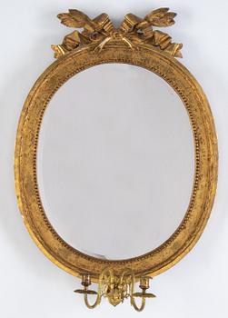 A Gustavian two-light girandole mirror, Stockholm, late 18th century.