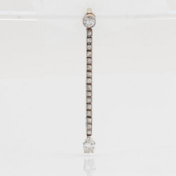 A platinum and 18K gold necklace and pendant.