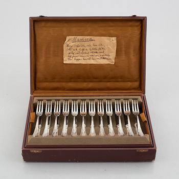 A set of 24 silver fruit knives and forks by Hanna Persson, Kristianstad, Sweden, 1923.