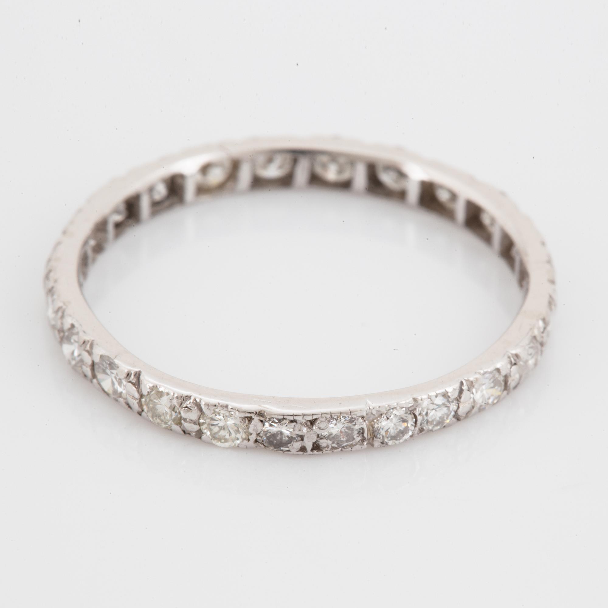 White gold brilliant-cut diamond eternity ring.