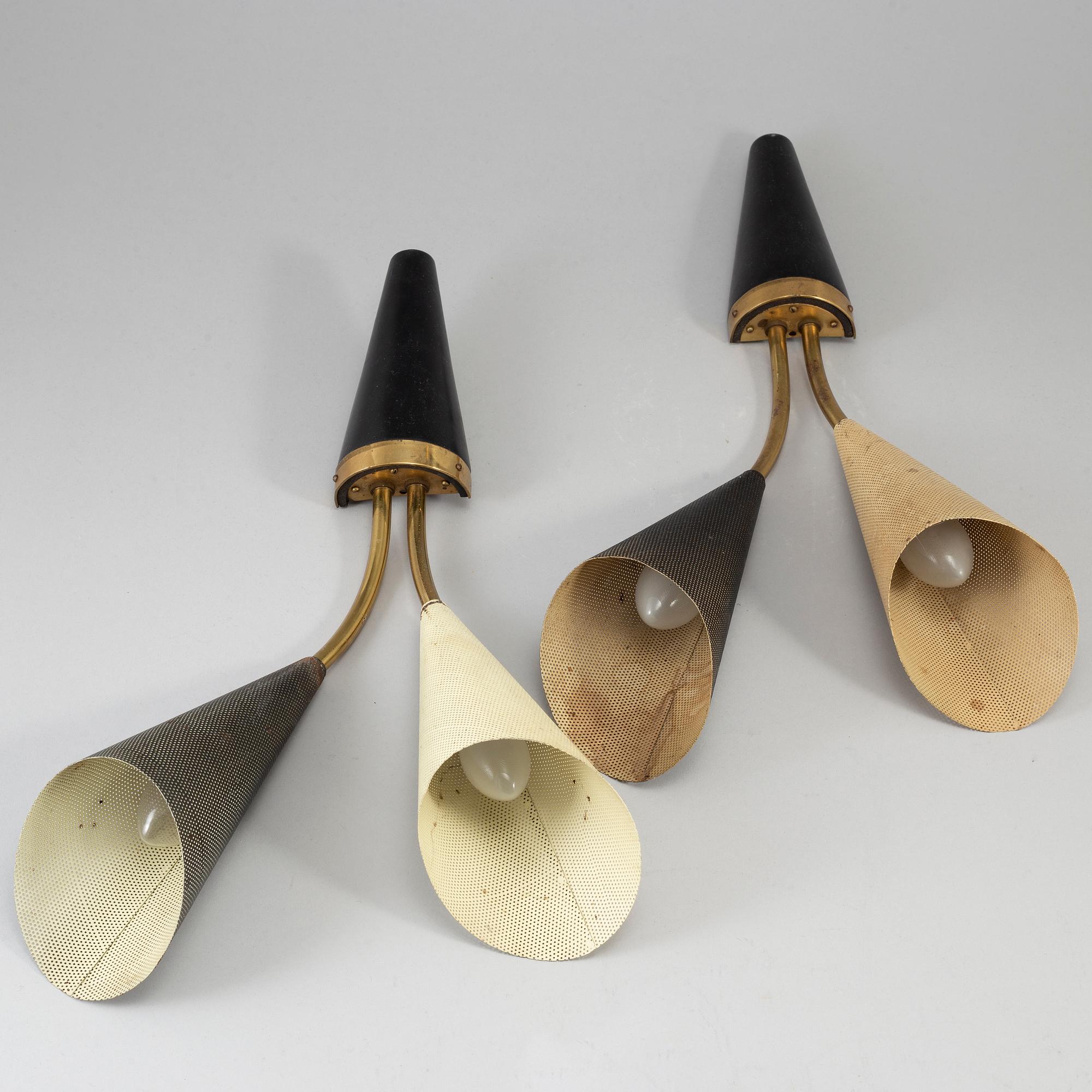 A pair of mid 20th century wall lights.
