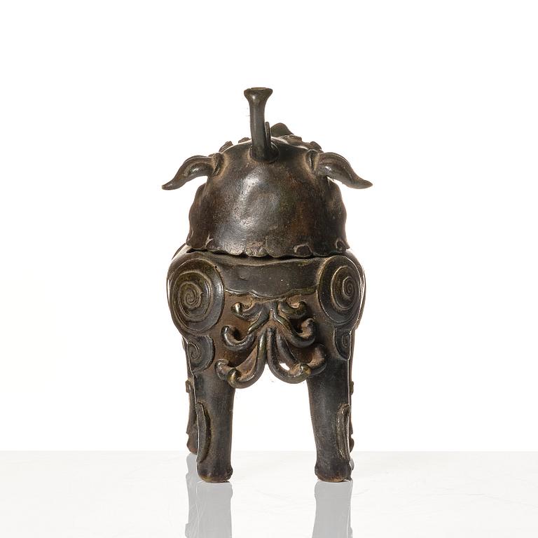 A bronze censer in the shape of a buddhist lion, Ming dynasty (1368-1644).