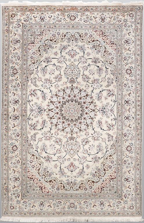A Nain part silk carpet, 244 x 156 cm.