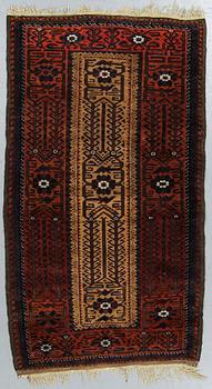 A rug, a semi-antique Baluch, ca 166 x 92 cm.