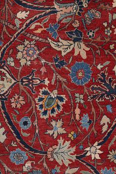 A carpet, semi-antique Tabriz, ca 359-364 x 259 cm.