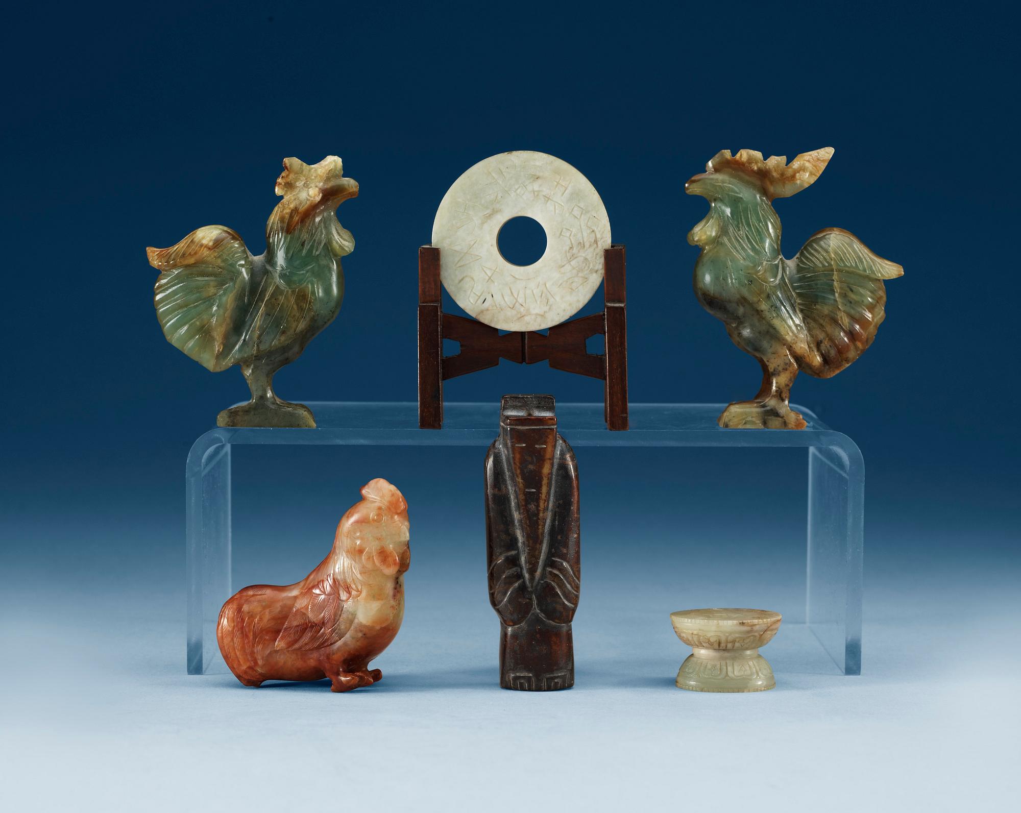 A set of six Chinese sculptured stone pieces.