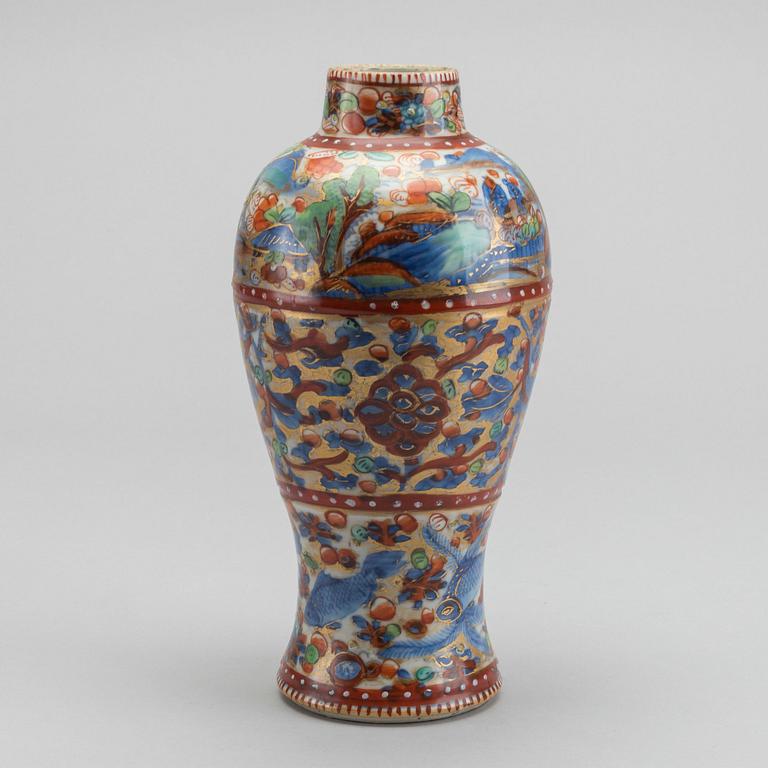 A Chinese clobbered 18th century porcelain vase, height ca 24 cm.